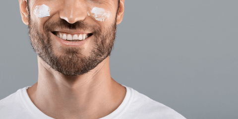 Stubbled smiling man
